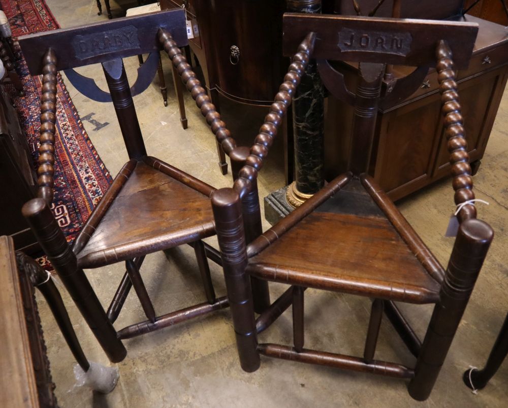 A pair of oak and beech Turners chairs